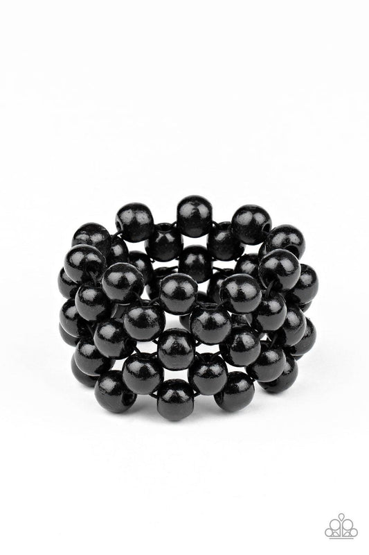Paparazzi Accessories Tiki Tropicana - Black An oversized collection of black wooden beads are threaded along stretchy bands that ornately weave across the wrist, creating a decorative summery pattern. Sold as one individual bracelet. Jewelry