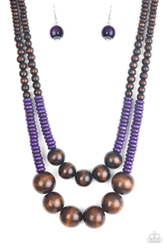 Paparazzi Accessories Cancun Cast Away - Purple Earthy brown and vivacious purple wooden beads and discs are threaded along shiny strands of brown cording, creating colorful layers. Features a button loop closure. Jewelry