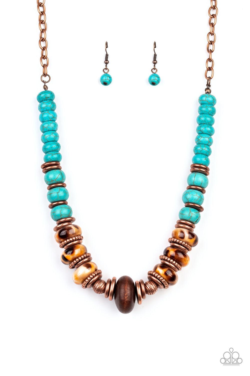 Paparazzi Accessories Desert Tranquility - Copper An earthy collection of dainty copper accents, rounded turquoise stone beads, and spotted ceramic-like beads are threaded along an invisible wire below the collar. An earthy wooden bead adorns the center,