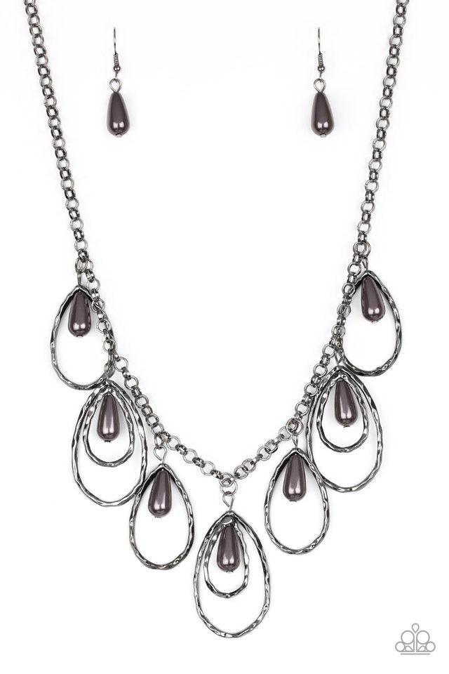 Paparazzi Accessories Rustic Ritz - Black Pearly gunmetal teardrop beads swing from the tops of delicately hammered gunmetal teardrop frames, creating a refined fringe below the collar. Features an adjustable clasp closure. Sold as one individual necklace