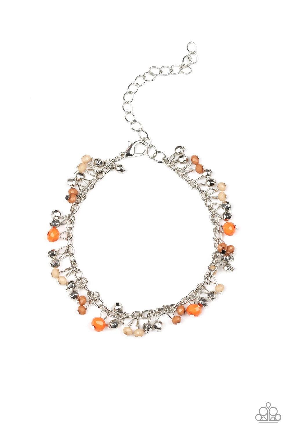 Paparazzi Accessories Aquatic Adventure - Orange A variety of faceted orange, Almond Buff, and Meerkat beads swing from a shimmery silver chain, creating a flirtatious fringe around the wrist. Faceted silver beads trickle between the colorful beads, addin