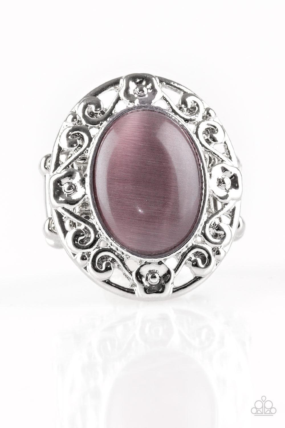 Paparazzi Accessories Moonlit Marigold - Purple Shimmery floral-like filigree swirls around a glowing purple moonstone center, creating a whimsical centerpiece atop the finger. Features a stretchy band for a flexible fit. Sold as one individual ring. Jewe