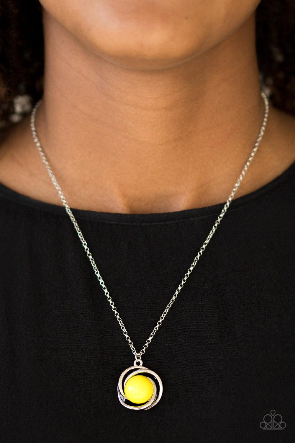Paparazzi Accessories Ripple Effect - Yellow Glistening silver bars swirl around a shiny yellow bead, creating a colorful pendant below the collar for a seasonal look. Features an adjustable clasp closure. Jewelry
