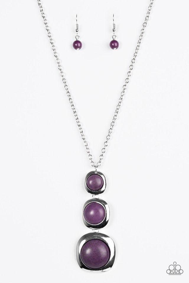Paparazzi Accessories Stone Tranquility - Purple Smooth purple stones are pressed into the centers of asymmetrical silver frames. Gradually increasing in size, the earthy stones connect into a dramatically stacked pendant. Features an adjustable clasp clo
