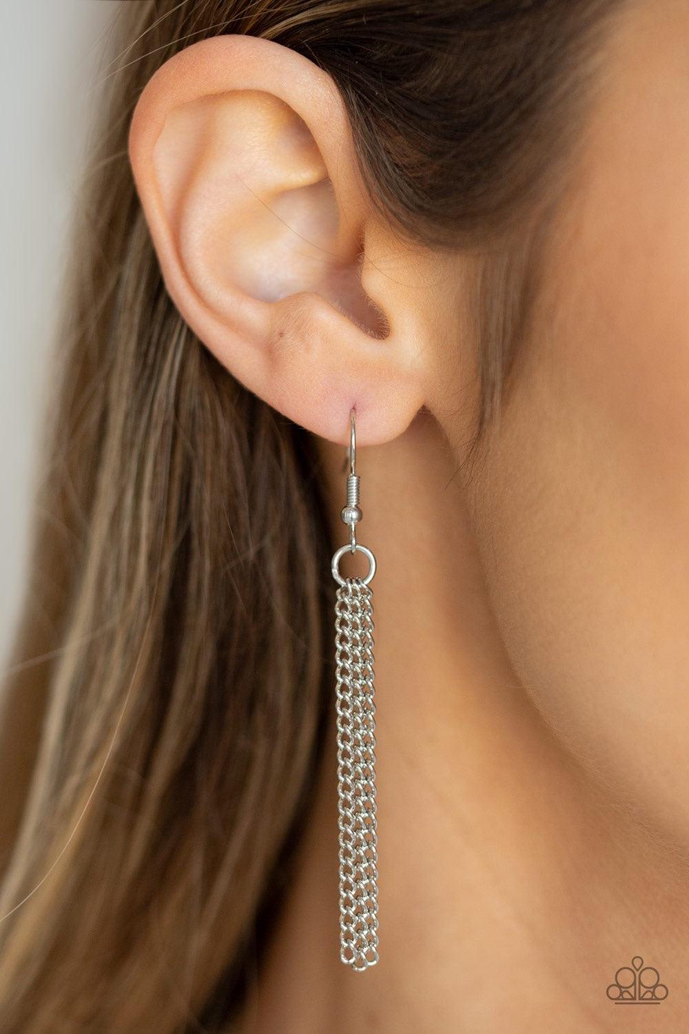 Paparazzi Accessories Spirit Trek - Black Featuring earthy black stone accents, ornate silver plates link at the bottom of a lengthened silver chain for a dramatic tribal look. Shimmery silver chains stream from the bottom of the stacked pendant, adding a