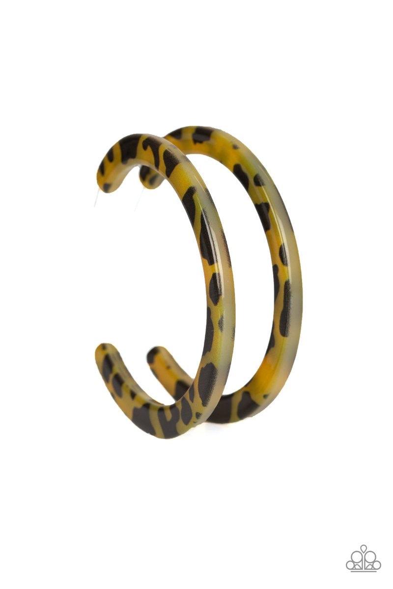 Paparazzi Accessories HAUTE Blooded - Yellow Featuring a tortoise-shell like pattern, a yellow acrylic frame curls around the ear for a retro flair. Earring attaches to a standard post fitting. Hoop measures 2 1/2" in diameter. Sold as one pair of hoop ea