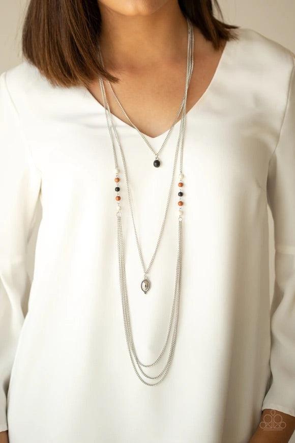 Paparazzi Accessories The Pony Express - Multi Multicolored stone beads give way to layers of shimmery silver chain down the chest. A black stone pendant and shiny silver frame drape above the cascade of silver chains for a seasonal flair. Features an adj