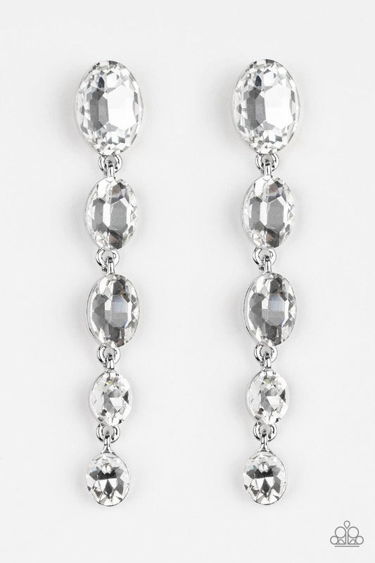 Paparazzi Accessories Red Carpet Radiance - White Gradually decreasing in size, glittery white gems trickle from the ear in a glamorous fashion. Earring attaches to a standard post fitting. Jewelry