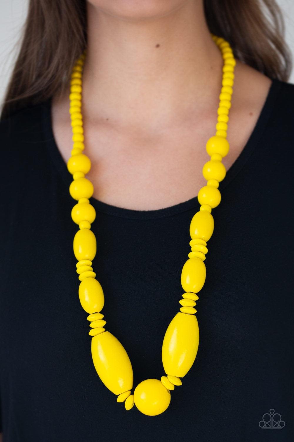 Paparazzi Accessories Summer Breezin - Yellow A variety of yellow wooden beads are threaded along a brown string draped across the chest for a summery flair. Jewelry