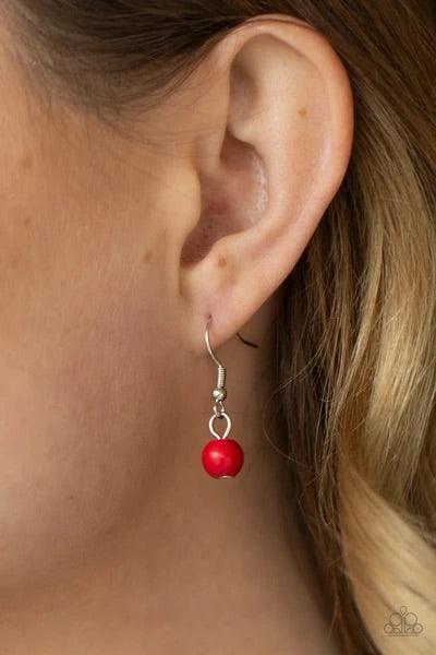 Paparazzi Accessories A Heart of Stone - Red Bordered by dainty red stones, an oversized red stone heart pendant swings from the bottom of a red stone and silver beaded display below the collar for a flirtatiously earthy fashion. Features an adjustable cl