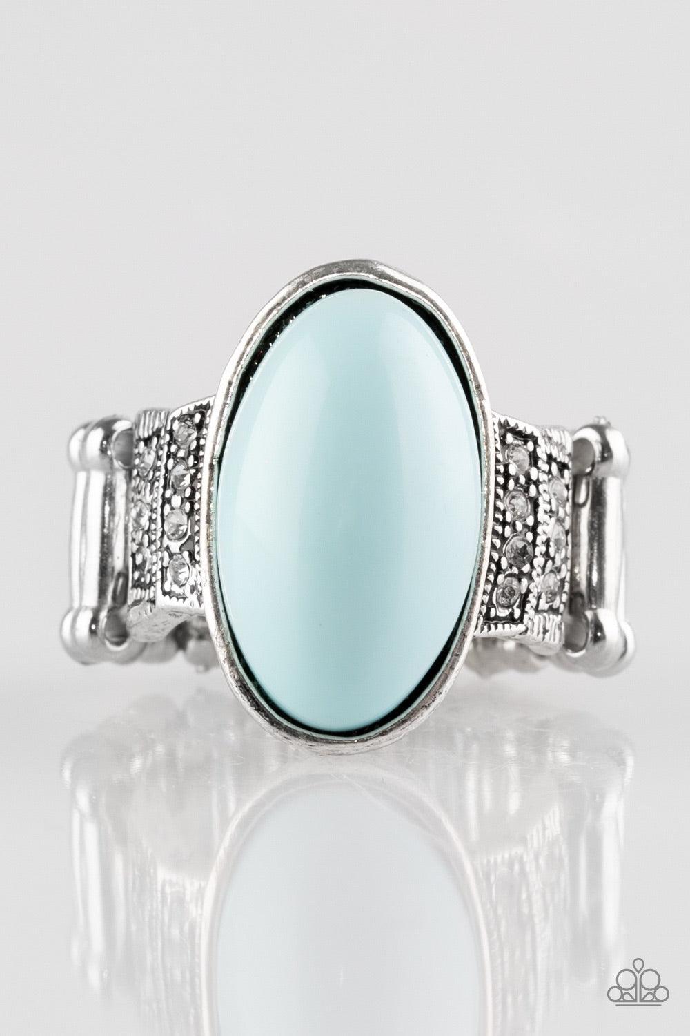 Paparazzi Accessories BEAD-To-Know Basis - Blue An oval blue bead adorns the center of an ornate silver band encrusted in rows of glittery white rhinestones for a seasonal look. Features a stretchy band for a flexible fit. Jewelry