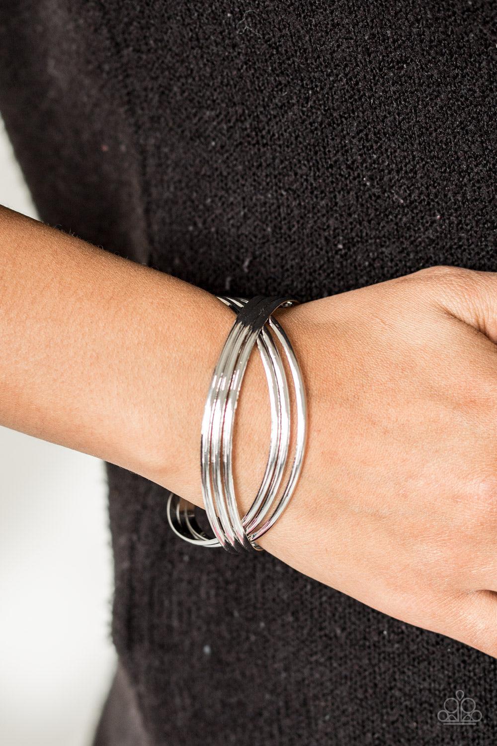 Paparazzi Accessories Fashion Scene - Silver Glistening silver bars swoop across the wrist, coalescing into an airy cuff. Sold as one individual bracelet. Jewelry