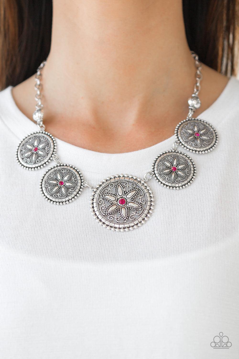 Paparazzi Accessories Written In The STAR LILLIES - Pink Dotted with glittery pink rhinestone centers, floral silver frames gradually increase in size as they link below the collar for a whimsical look. Features an adjustable clasp closure. Jewelry