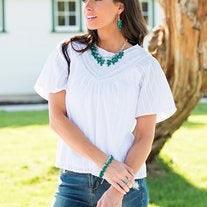 Paparazzi Accessories Malibu Masquerade - Green Featuring round and teardrop shapes, clusters of faceted Quetzal Green beads swing from a shimmery silver chain, creating a playful fringe around the wrist. Features an adjustable clasp closure. Jewelry