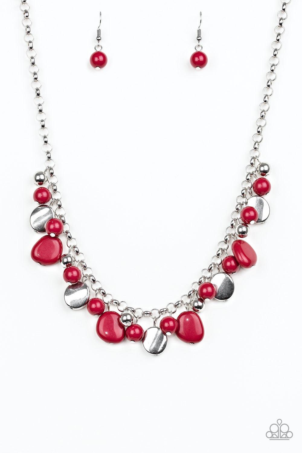 Paparazzi Accessories Flirtatiously Florida ~Red Featuring round and asymmetrical shapes, shiny silver and red beads swing from the bottom of a bold silver chain, creating a flirtatious fringe below the collar. Features an adjustable clasp closure.