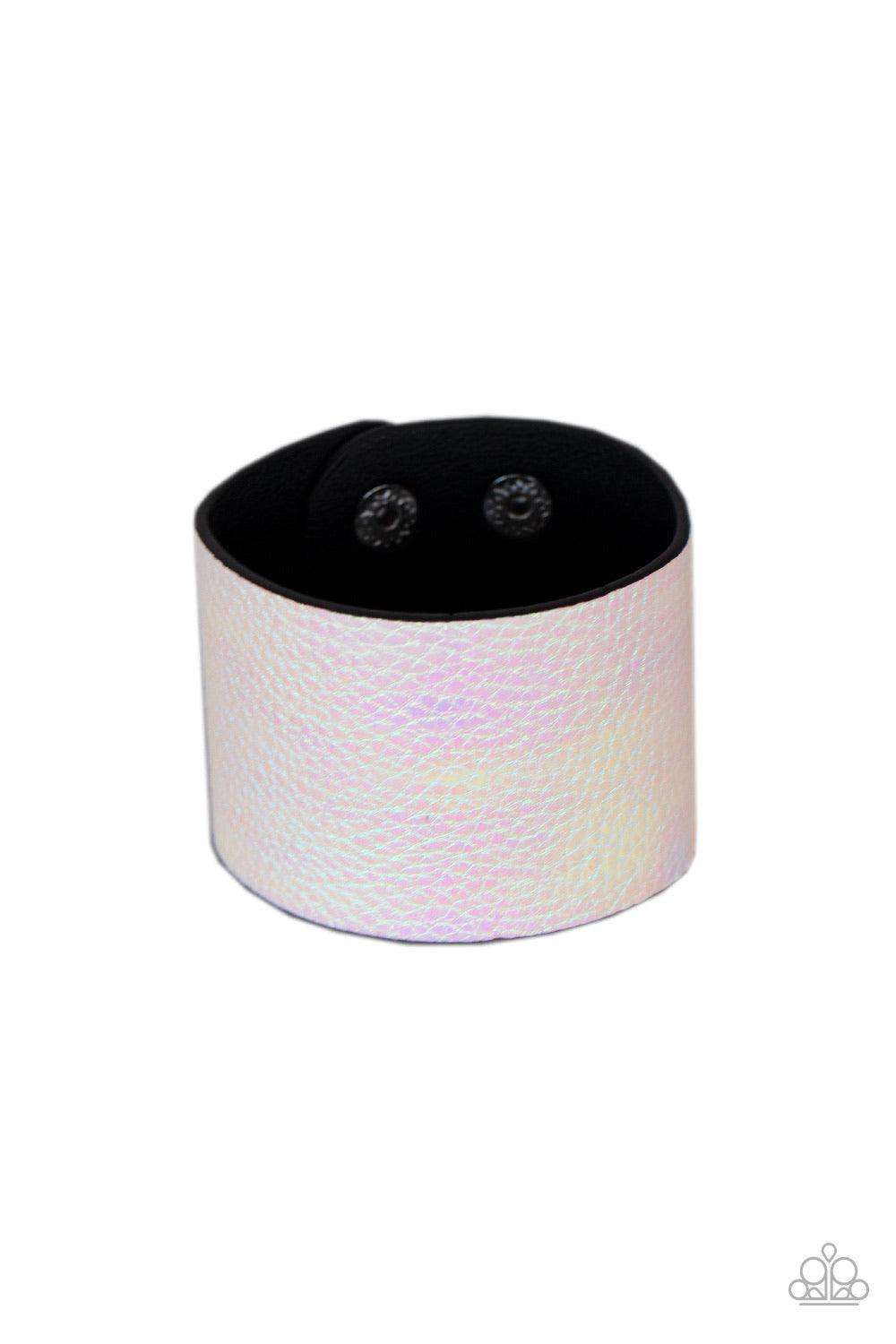 Paparazzi Accessories Cosmo Cruise - White Featuring an iridescent crocodile print, a shimmery white leather band wraps around the wrist for an out-of-this-world fashion. Features an adjustable snap closure. Sold as one individual bracelet. Jewelry