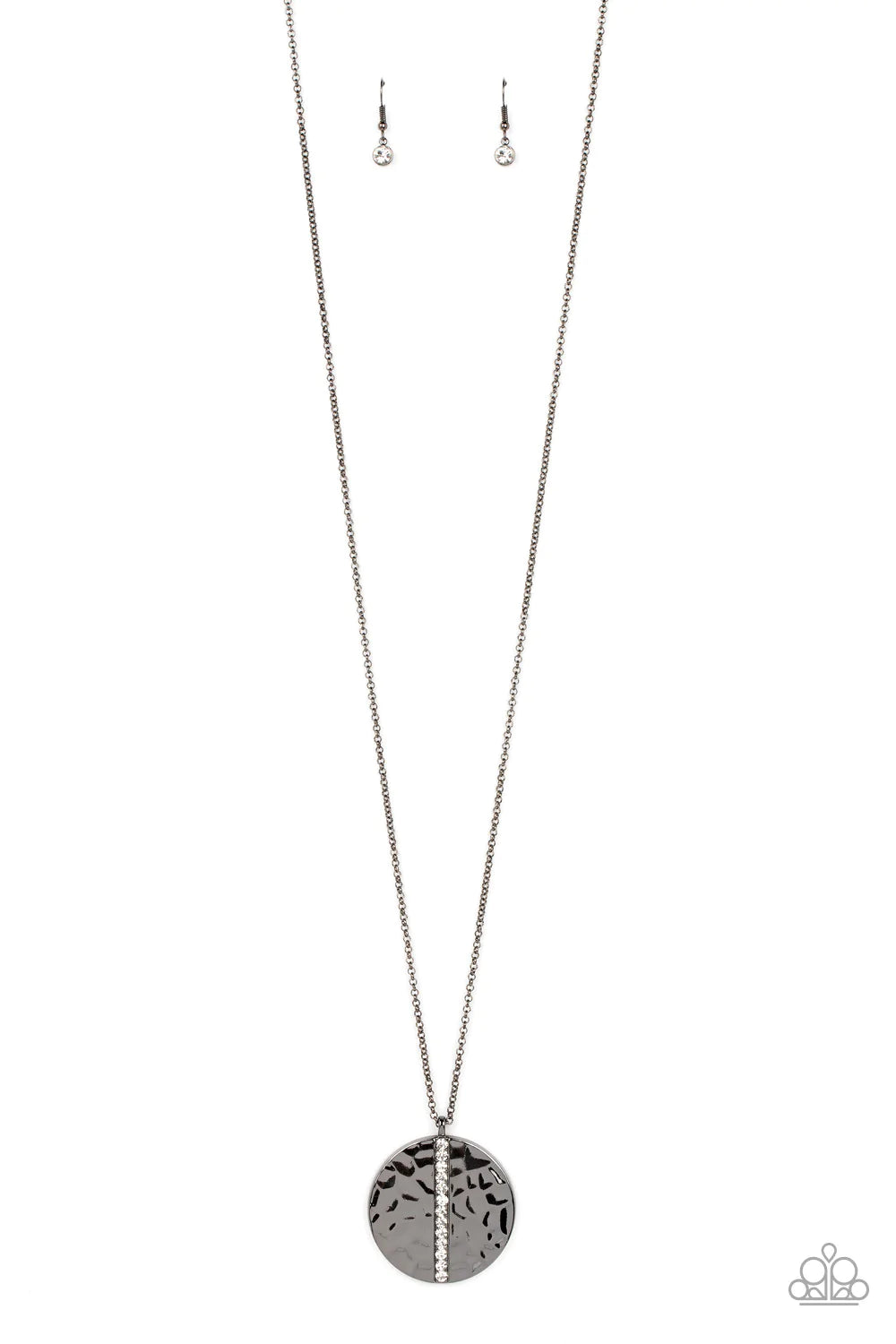 Paparazzi Accessories Token of My Gratitude - Black An icy row of glittering white rhinestones is pressed into the center of a hammered gunmetal disc, splitting the oversized pendant seemingly in two as it swings from the bottom of an extended gunmetal ch