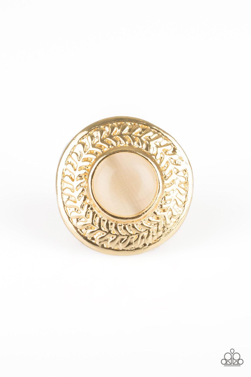 Paparazzi Accessories Garden Garland ~Gold A golden moonstone is pressed into a large gold frame embossed in a leafy pattern for a whimsical look. Features a stretchy band for a flexible fit.