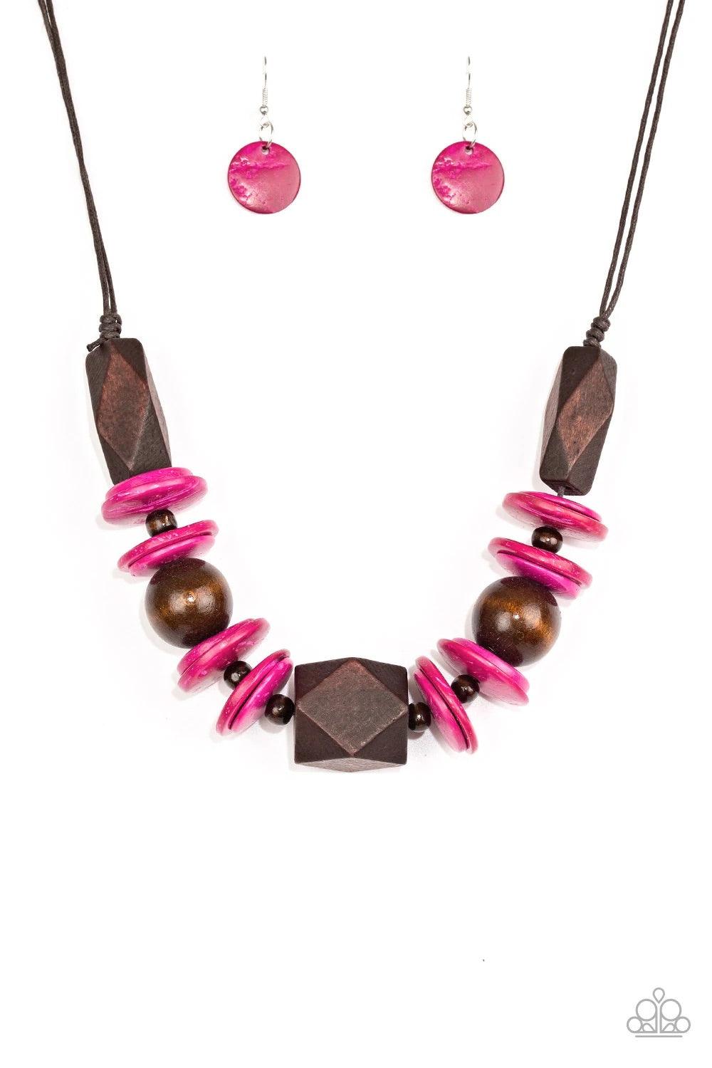 Paparazzi Accessories Pacific Paradise - Pink Featuring abstract geometric finishes, mismatched brown wooden beads and vivacious pink accents are threaded along shiny brown cording. A dramatic geometric bead adorns the center, creating a bold summery look