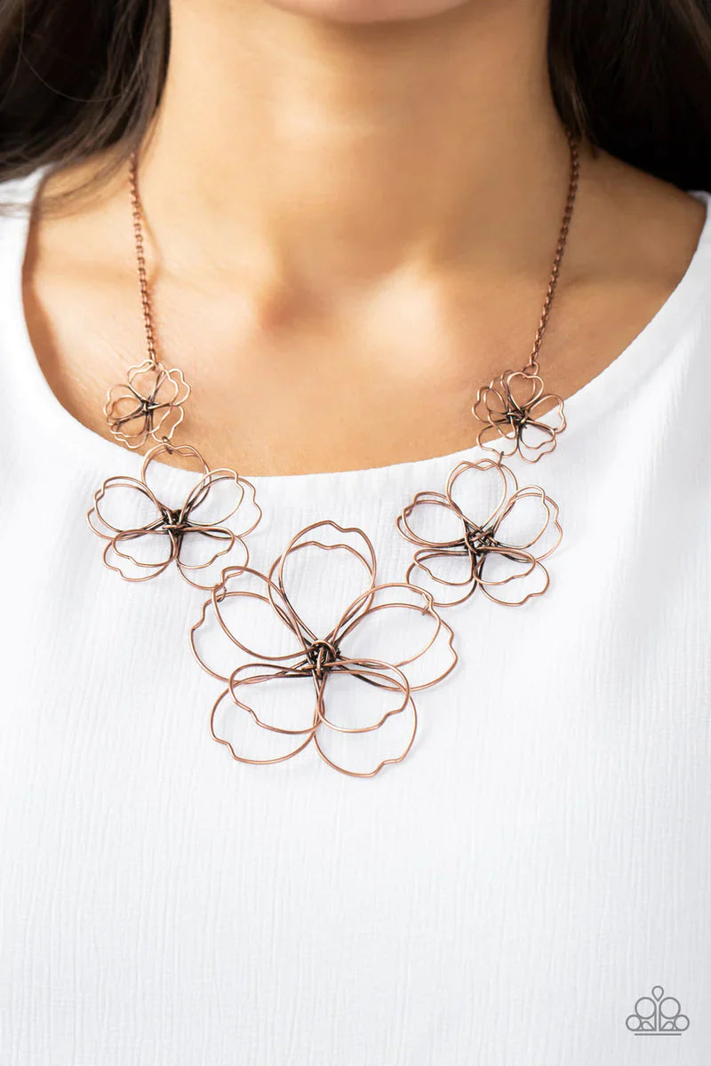 Paparazzi Accessories The Show Must GROW On - Copper Rustic copper wire delicately twists into oversized blossoms. Gradually increasing in size, the 3D frames elegantly pop beneath the collar. Features an adjustable clasp closure. Sold as one individual n