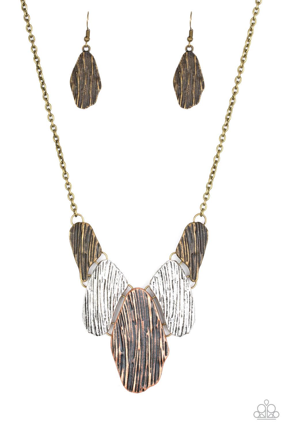 Paparazzi Accessories A New DISCovery - Multi Engraved in antiqued textures, asymmetrical brass, copper, and silver plates link below the collar for an edgy look. Features an adjustable clasp closure. Sold as one individual necklace. Includes one pair of
