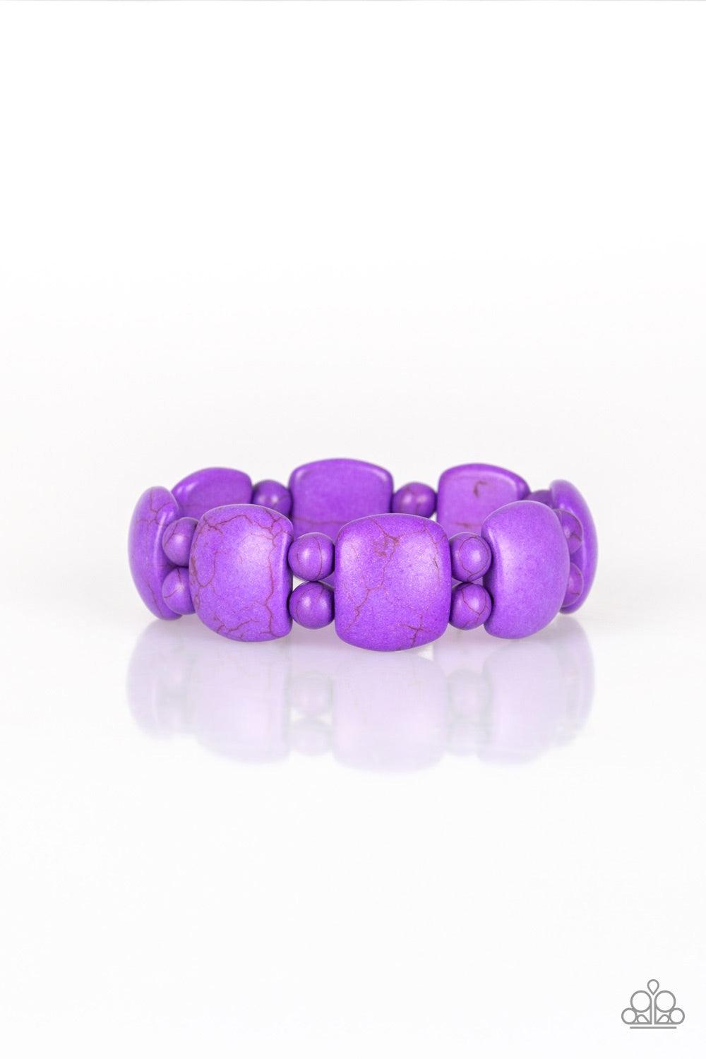 Paparazzi Accessories Don’t Be So NOMADIC! - Purple A collection of round and square-like purple stones are threaded along stretchy bands around the wrist for a seasonal look. Jewelry