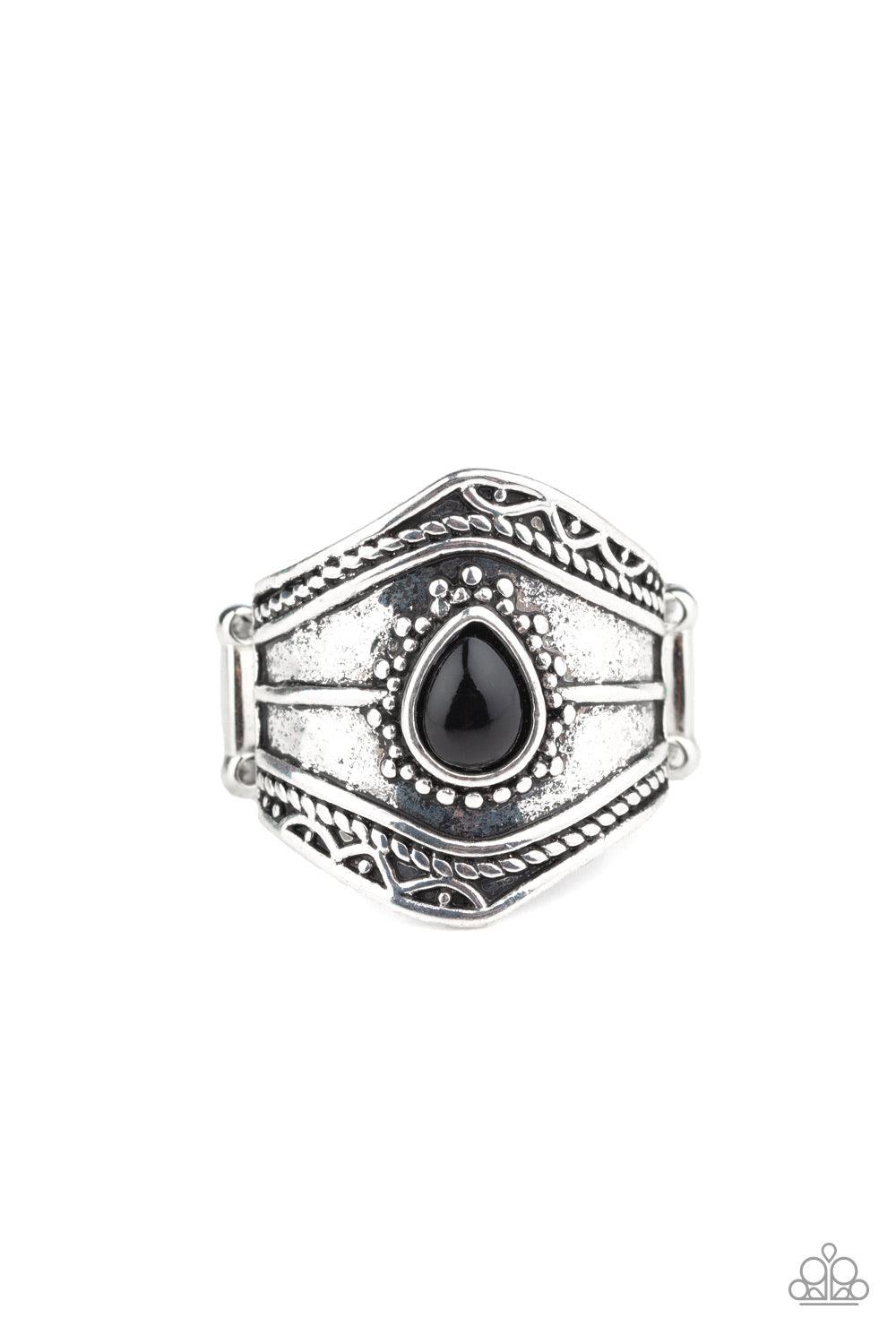 Paparazzi Accessories Tribe Mode - Black A teardrop black bead is pressed into the center of a thick silver band featuring antiqued studded and filigree details for a tribal inspired finish. Features a stretchy band for a flexible fit. Sold as one individ
