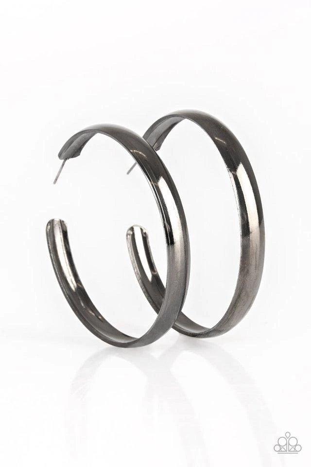 Paparazzi Accessories A Double Feature - Black Brushed in a high sheen finish, a thick gunmetal hoop curls around the ear for a classic look. Earring attaches to a standard post fitting. Hoop measures 2 1/4" in diameter. Sold as one pair of hoop earrings.