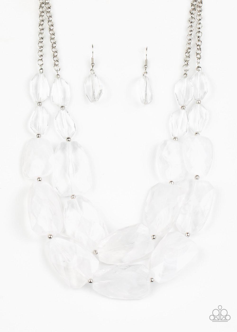 Paparazzi Accessories Gives Me Chills - White Varying in shape and size, opaque and glassy crystal-like beads delicately link into two icy layers below the collar for a stunning statement-making finish. Features an adjustable clasp closure. Sold as one in
