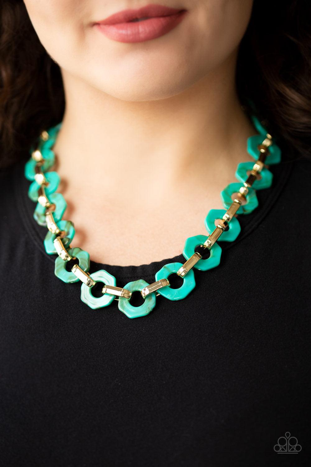 Paparazzi Accessories Fashionista Fever ~Blue Glistening gold fittings link with blue hexagon-like acrylic frames below the collar for a seasonal flair. Features an adjustable clasp closure.