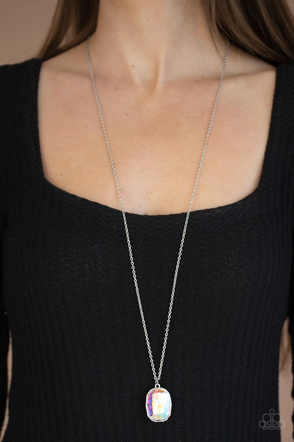 Paparazzi Accessories Imperfect Iridescence - Multi Featuring an oil spill finish, an imperfect gem is pressed into the center of an edgy silver frame at the bottom of a lengthened silver chain for a glitzy look. Features an adjustable clasp closure. Sold
