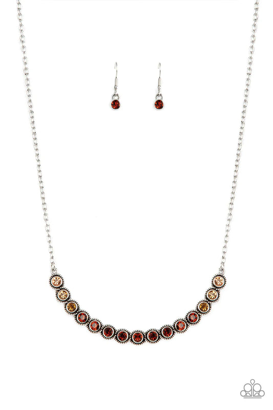 Paparazzi Accessories Throwing Shades - Brown Encased in studded silver fittings, a glittery ombré of topaz rhinestones delicately bows below the collar, creating an enchanting pop of color. Features an adjustable clasp closure. Sold as one individual nec