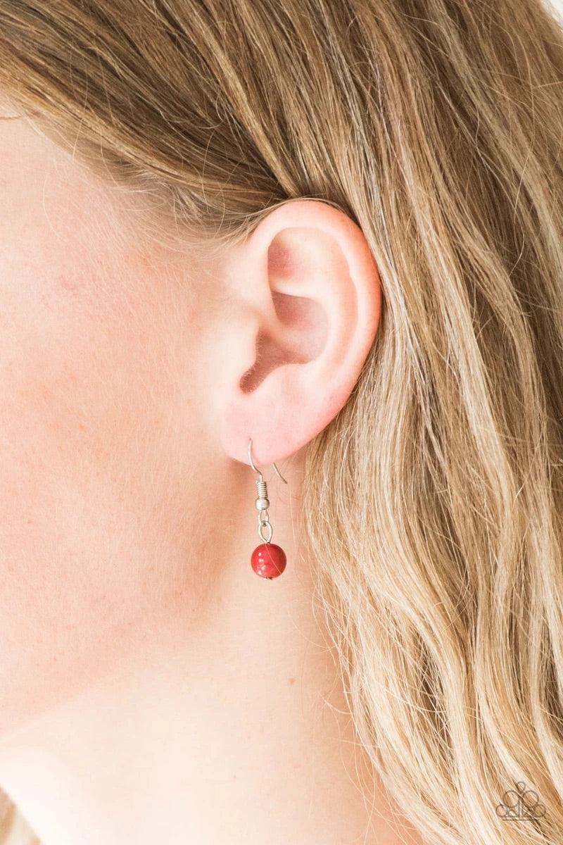 Paparazzi Accessories Pretty Pop-tastic! - Red Ornate silver accents, glassy beads, and polished red beads trickle along strands of shimmery silver chains for a whimsical look. Features an adjustable clasp closure. Sold as one individual necklace. Include