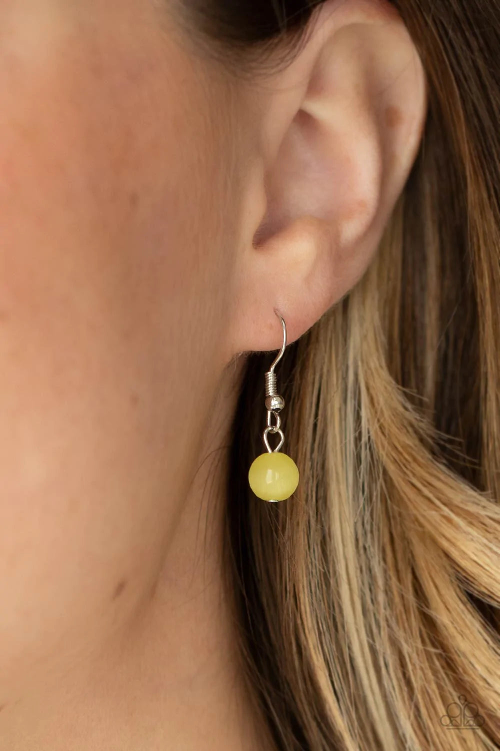 Paparazzi Accessories Ritzy Refinement - Yellow Smoldering yellow cat's eye stones and silver accents delicately link across the collar. A stunning yellow cat's eye teardrop pendant swings from a silver loop for a sophisticated and refined finish. Feature