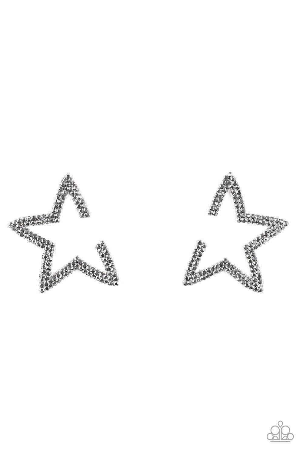 Paparazzi Accessories Star Player - Silver Encrusted in two rows of smoky hematite rhinestones, a gunmetal star frame dots the ear for a stellar shimmer. To flatter the natural contour of the face, one side angle of the star frame is intentionally left op