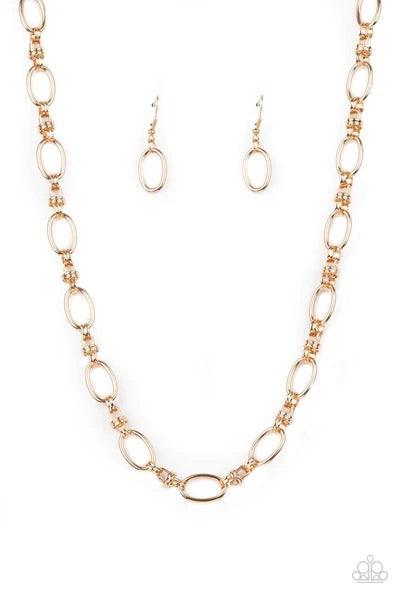 Paparazzi Accessories Defined Drama - Gold Pairs of joined gold links connect a collection of gold oval frames below the collar, creating an edgy chain. Features an adjustable clasp closure. Sold as one individual necklace. Includes one pair of matching e