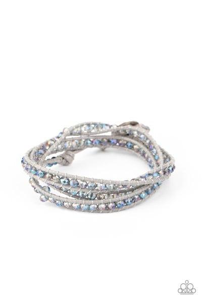 Paparazzi Accessories What Goes Around - Multi A dainty collection of iridescent crystal-like beads are delicately threaded between two strands of shiny gray cording, coalescing into a trendy double wrap bracelet around the wrist. Features an adjustable b