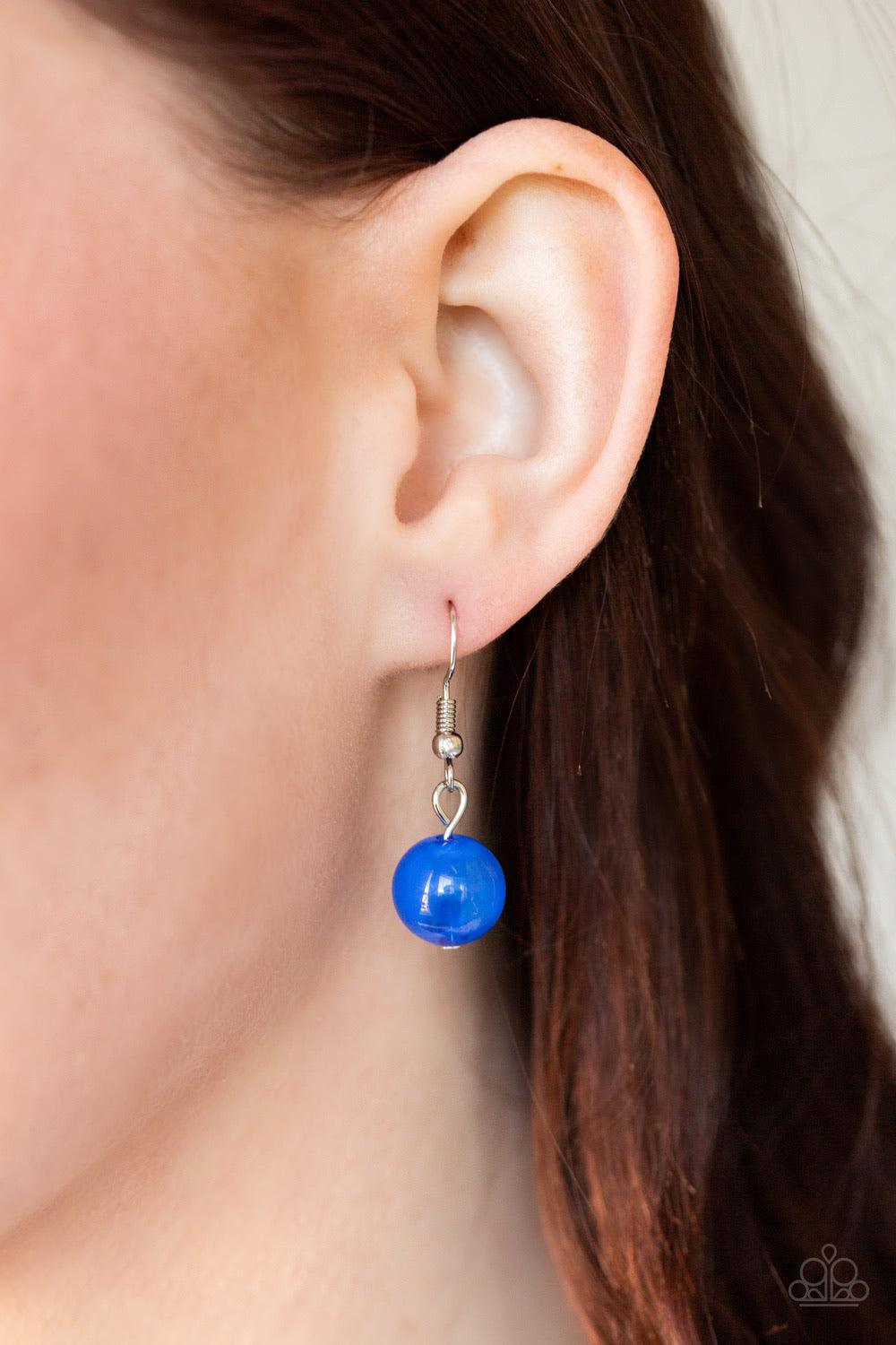 Paparazzi Accessories Beach Glam - Blue Varying in shape and opacity, a refreshing collection of glassy and iridescent Galaxy Blue beads layer below the collar for a boldly colorful look. Features an adjustable clasp closure. Sold as one individual neckla