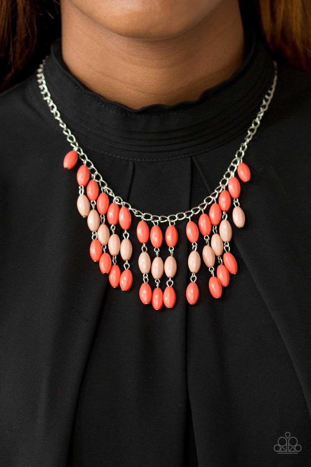 Paparazzi Accessories Delhi Diva - Orange Faceted orange and tan beads cascade from the bottom of a shimmery silver chain, creating a flirty fringe below the collar. Features an adjustable clasp closure. Jewelry