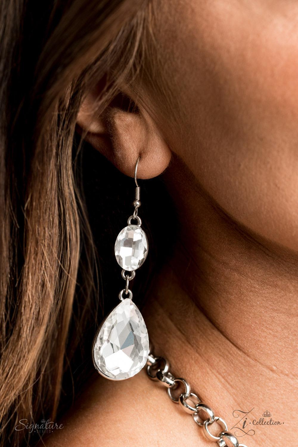 Paparazzi Accessories The Sarah 💗💗ZiCollection $25💗💗 Tiers of oversized white teardrop gems demand attention as they drip from two blinding rows of elegantly linked white oval rhinestones. Infused with sections of chunky silver chain links, the sparkl