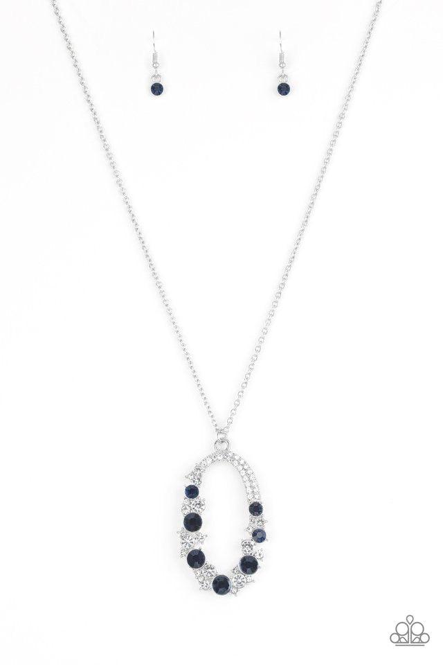 Paparazzi Accessories Spotlight Social - Blue Varying in size, an array of glittery white and blue rhinestones are encrusted along a shimmery silver hoop. The sparkling pendant swings from the bottom of an elongated silver chain for a glamorous finish. Fe