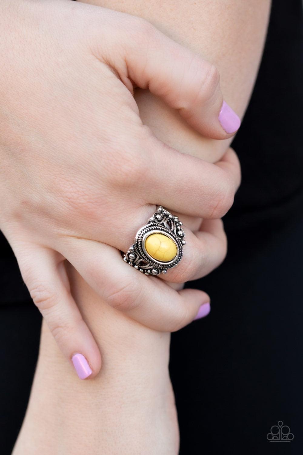 Paparazzi Accessories Coyote Canyon - Yellow A yellow stone is pressed into the center of an ornate silver band for a seasonal look. Features a stretchy band for a flexible fit. Jewelry