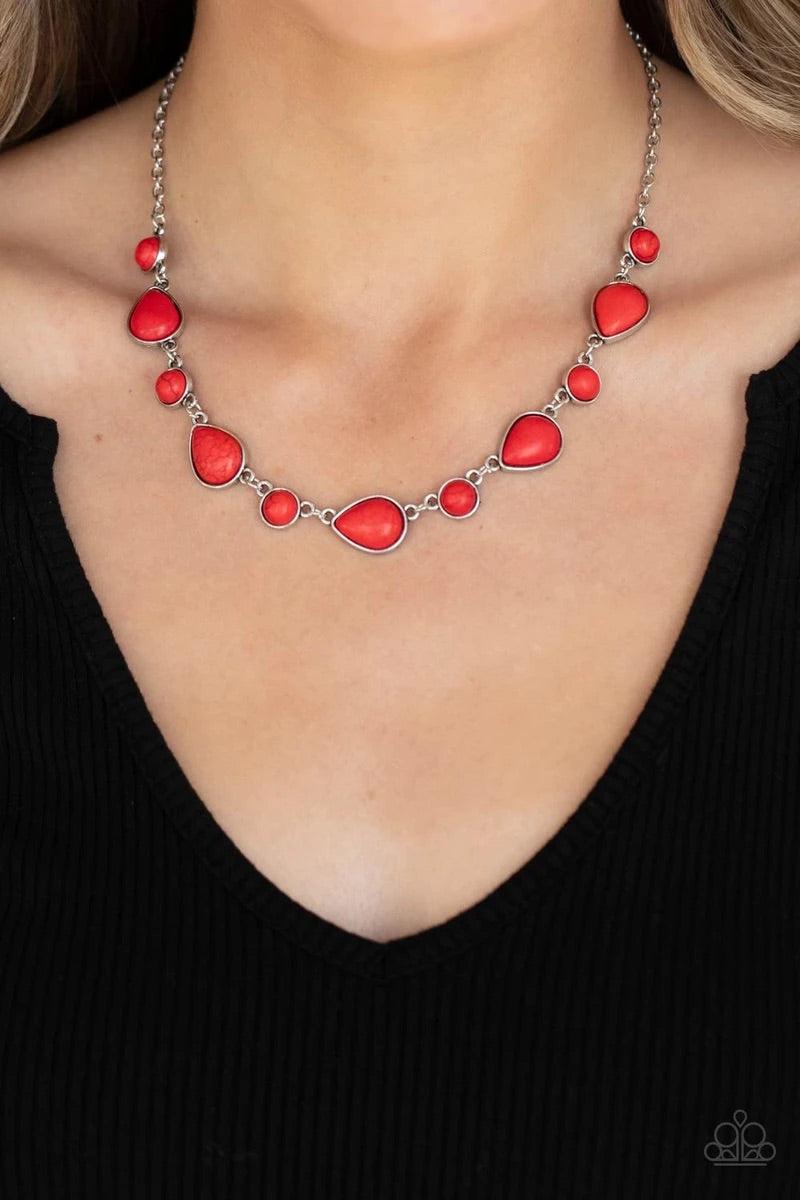 Paparazzi Accessories Heavenly Teardrops - Red Encased in sleek silver frames, a fiery collection of round and teardrop red stones delicately link below the collar for a whimsical pop of color. Features an adjustable clasp closure. Sold as one individual