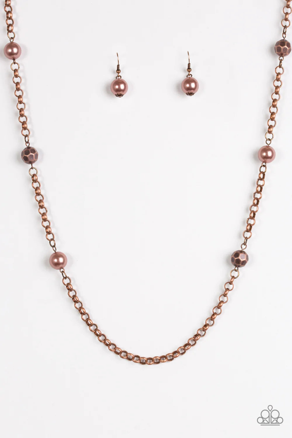 Paparazzi Accessories Showroom Shimmer - Copper Pearly and faceted copper beads trickle along a bold copper chain, creating a fierce tone on tone palette. Features an adjustable clasp closure. Sold as one individual necklace. Includes one pair of matching