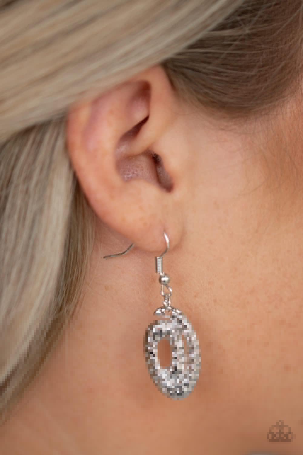 Paparazzi Accessories Metro Mystique - Silver A trio of smoky marquise-cut rhinestones are nestled inside swirls of hammered silver frames, creating a dazzling statement piece below the collar. Features an adjustable clasp closure. Jewelry