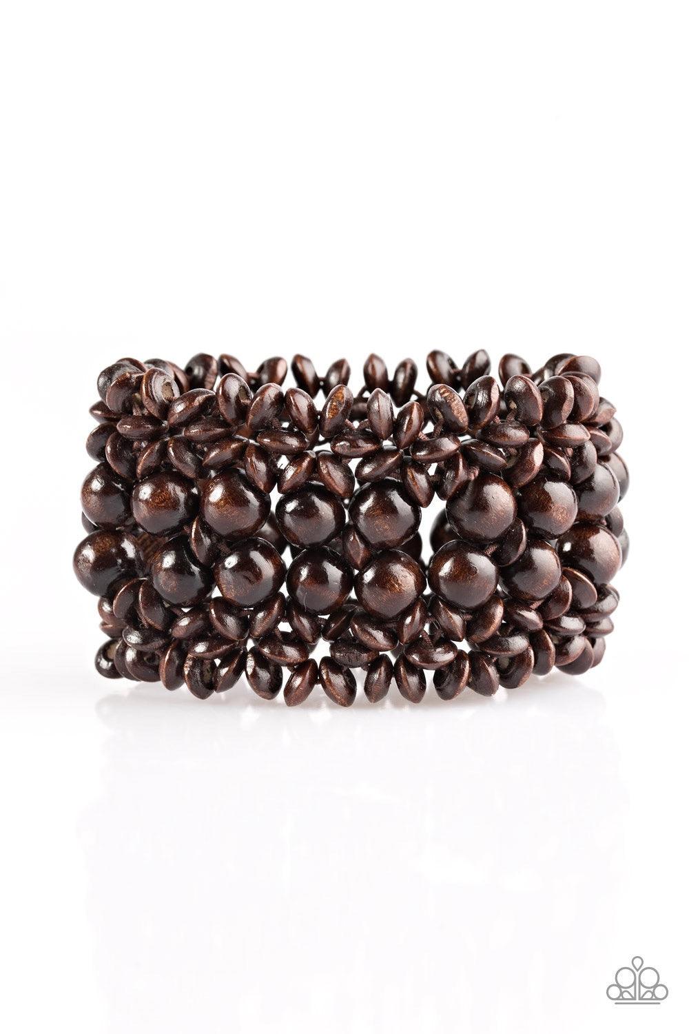 Paparazzi Accessories Tropical Bliss - Brown Brown wooden accents are threaded along elastic stretchy bands, creating an ornate bracelet. Rounded brown wooden beads line the center of the summery pattern for a bold finish. Jewelry