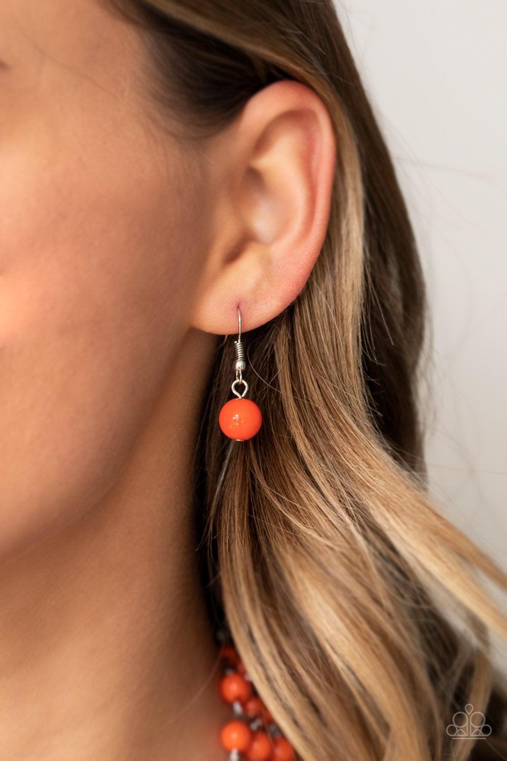 Paparazzi Accessories A La Vogue - Orange Sections of thick silver chains and bubbly orange beaded rows layer below the collar, creating statement-making layers. Features an adjustable clasp closure. Jewelry