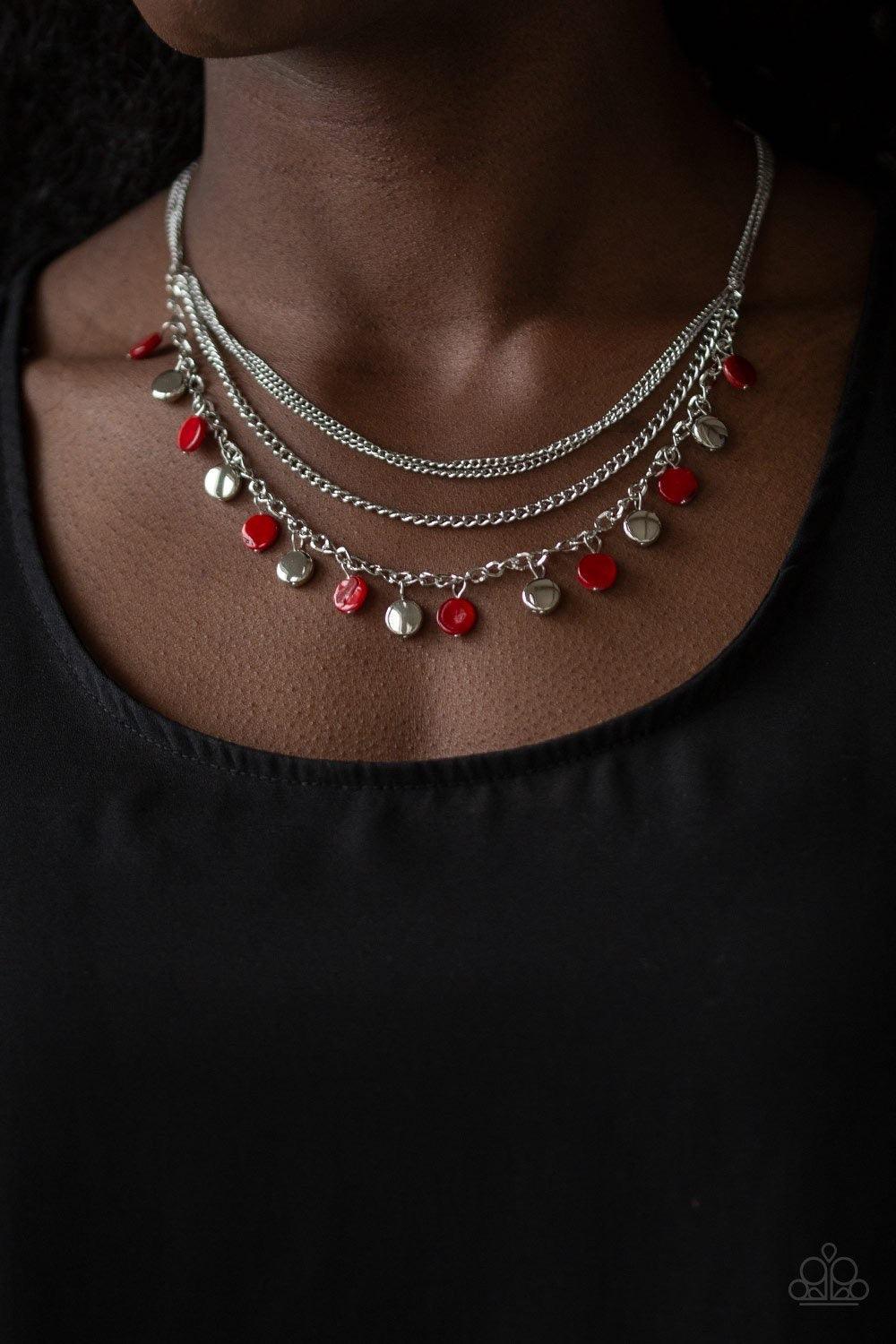Paparazzi Accessories Beach Flavor - Red Mismatched silver chains layer below the collar. Shell-like red beads and shiny silver beads trickle from the lowermost chain, creating an iridescent fringe. Features an adjustable clasp closure. Jewelry