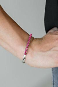 Paparazzi Accessories New Age Traveler - Pink Dainty pink beads are encrusted along the center of a dainty silver cuff stamped in tribal inspired patterns for a seasonal look. Jewelry