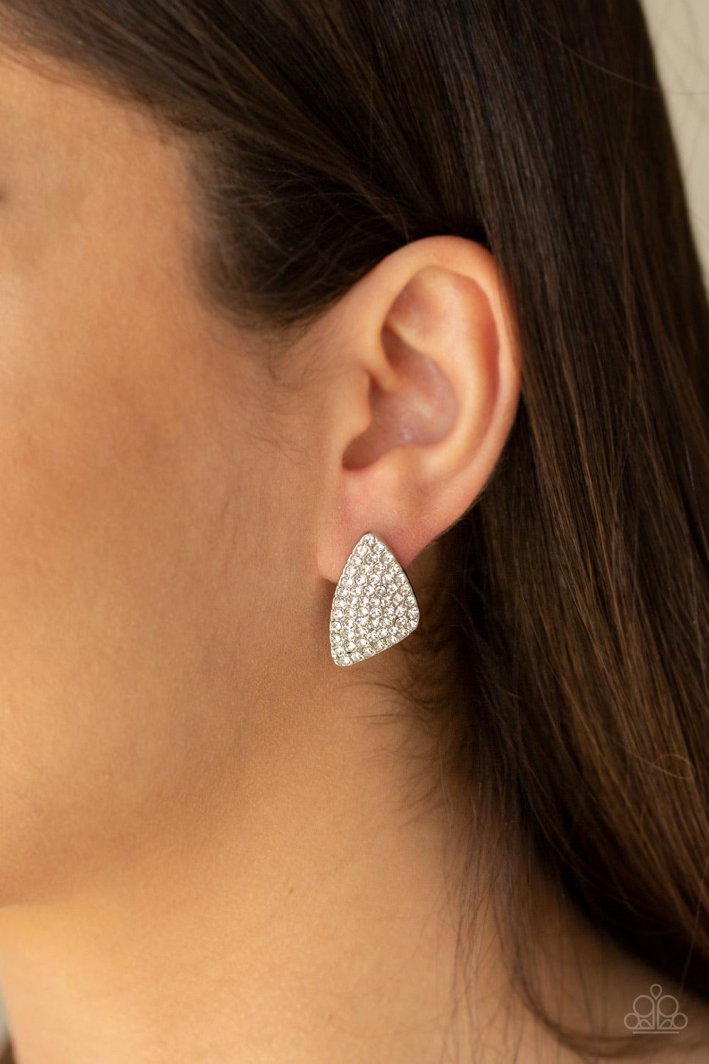 Paparazzi Accessories Supreme Sheen - Silver The front of a triangular shaped frame is encrusted in row after row of glassy white rhinestones for a blinding look. Earring attaches to a standard post fitting. Jewelry